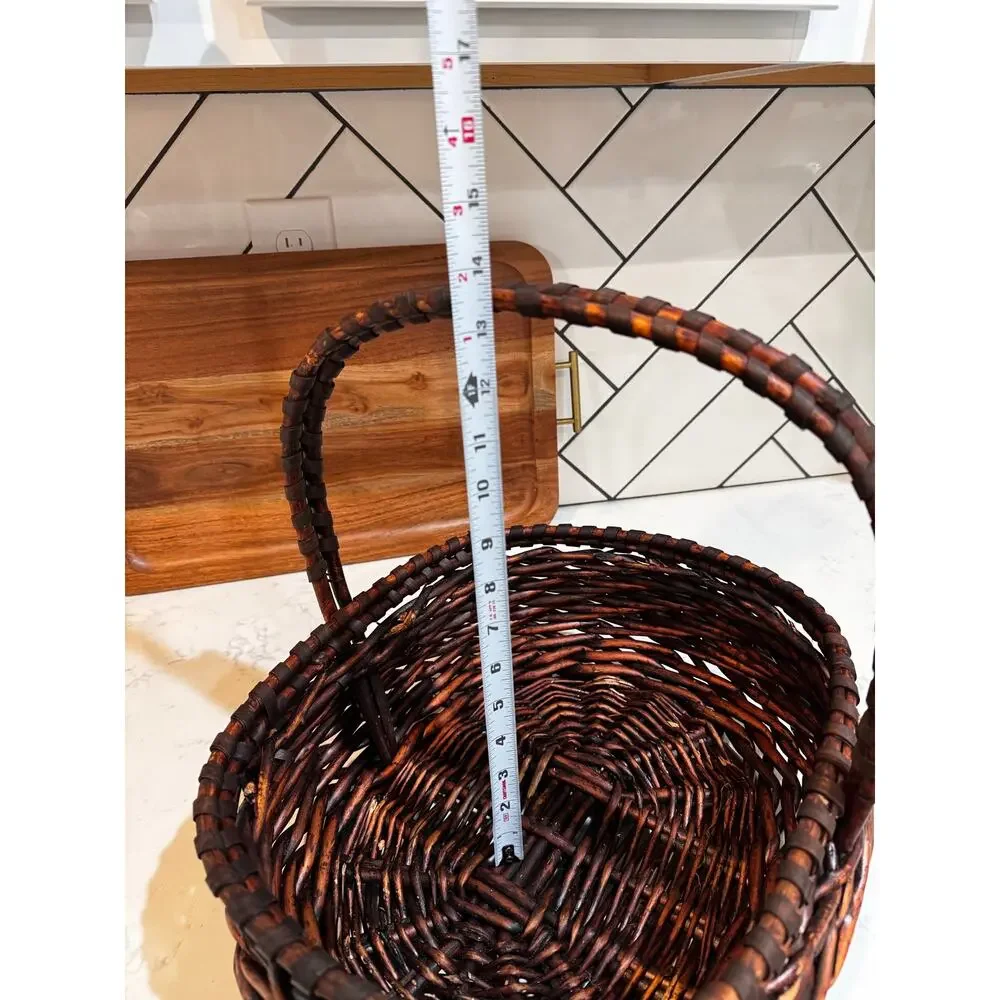 dark stained willow basket rustic handwoven texture sturdy center handle vintage